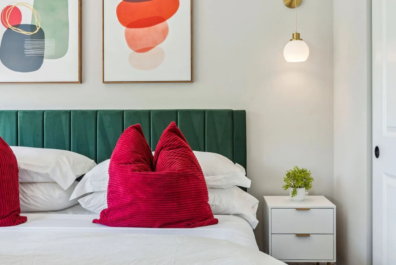 The king bed is the centerpiece of the room, offering a plush and inviting space where you can rest and recharge.