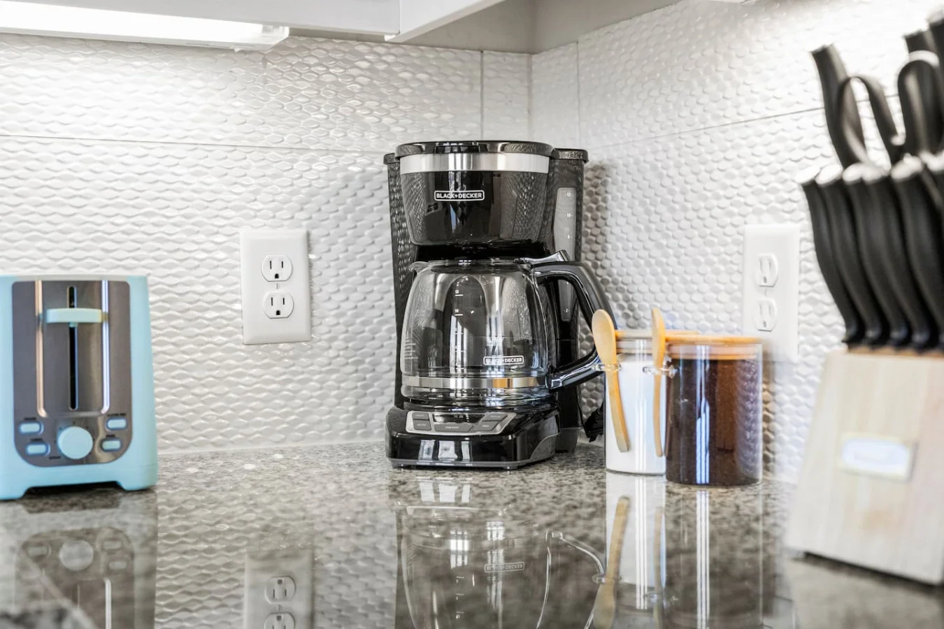 Fully equipped kitchen with all the tools you need for a perfect culinary experience. Enjoy the convenience of having everything at your fingertips!