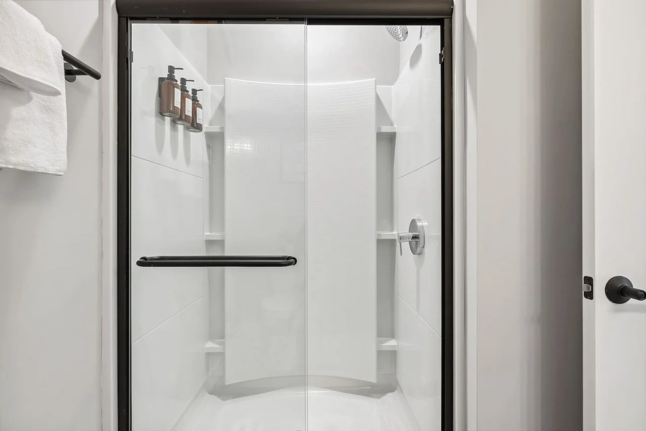 You feel a sense of calm as you enter the bathroom, where the thoughtful design and high-quality materials create a serene environment.