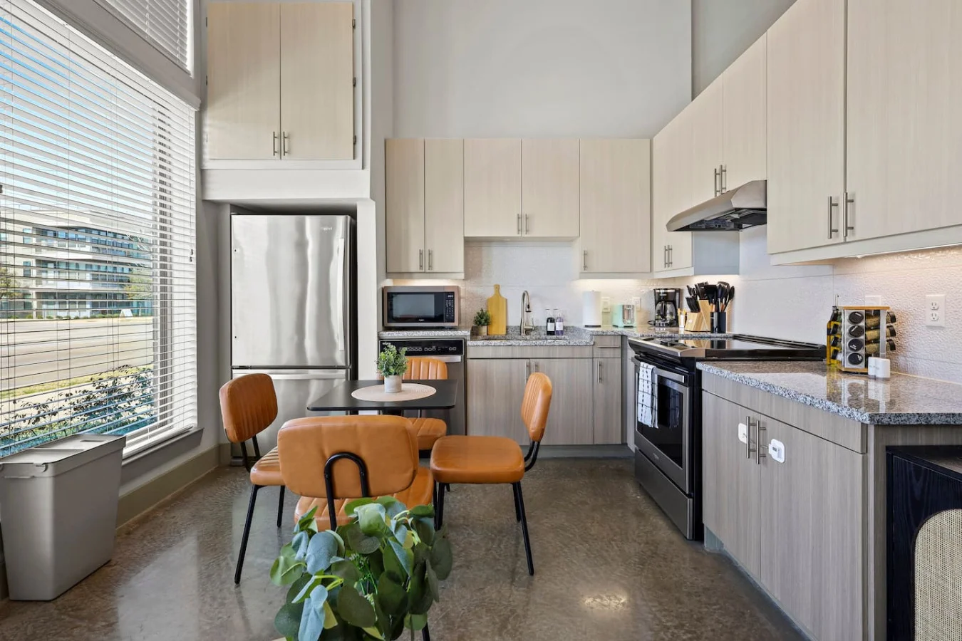 The kitchen’s open layout allows you to move freely as you prepare meals, with everything you need at your fingertips.