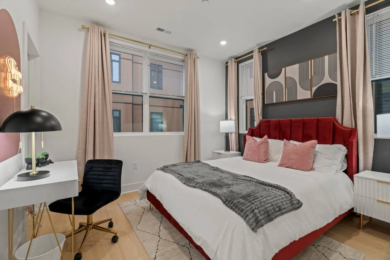 Spacious bedroom with a plush queen-size bed that comfortably sleeps 2 + dedicated workspace