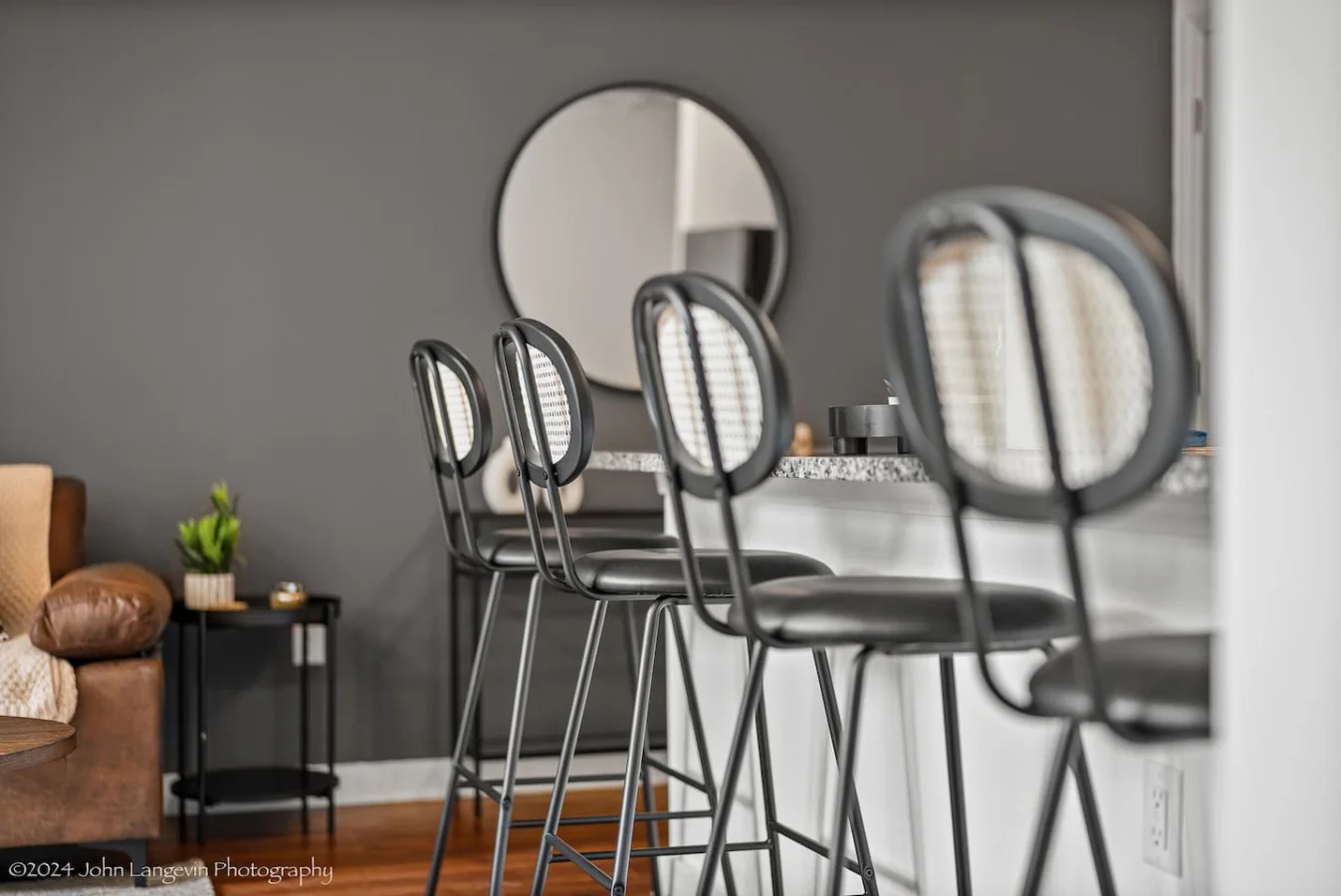 Elegant dining area with a large table and comfortable seating, perfect for gathering with family and friends for a meal.