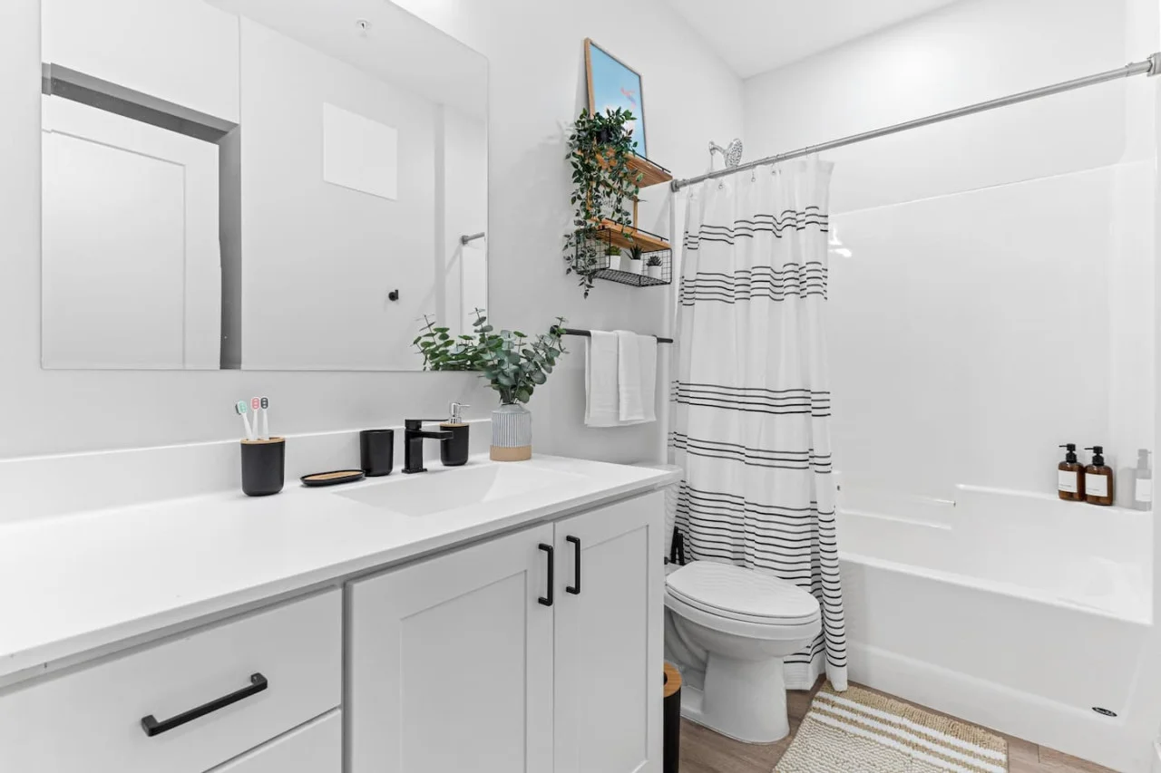 Fully equipped bathroom w/ Bathtub shower - Toilet - Large mirror - Sink and vanity - Towels - Bath mats - Body wash - Shampoo - Conditioner - Shower curtain - Soap dispenser and more.