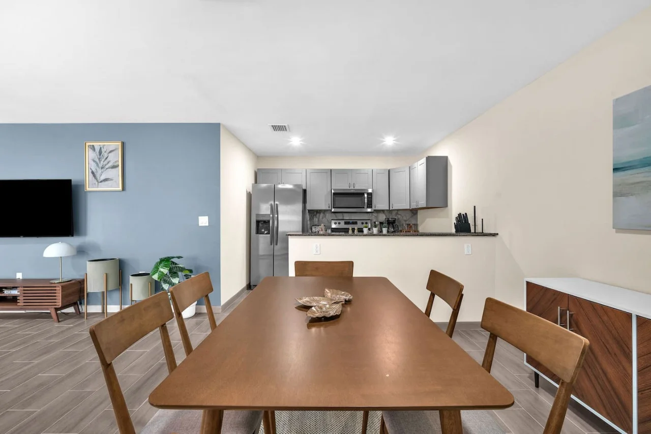 The dining area invites you to savor every moment, whether enjoying a quiet meal or hosting a festive gathering.