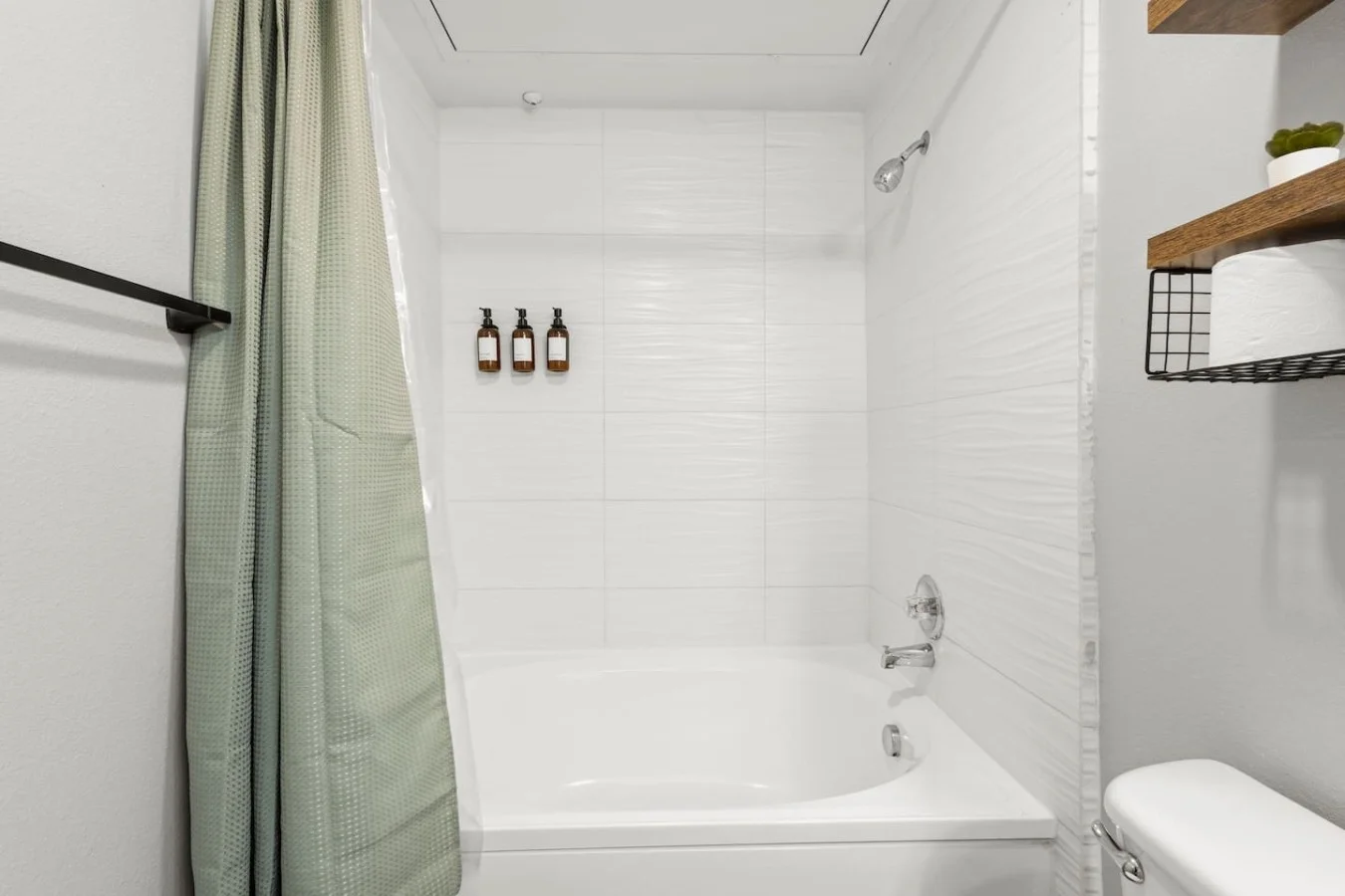 Bathtub/Shower with Shampoo and Soap