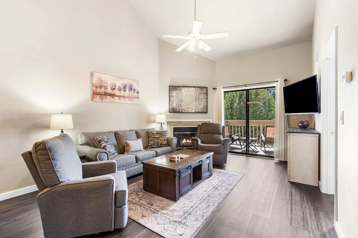 Family room with access to private outdoor patio.