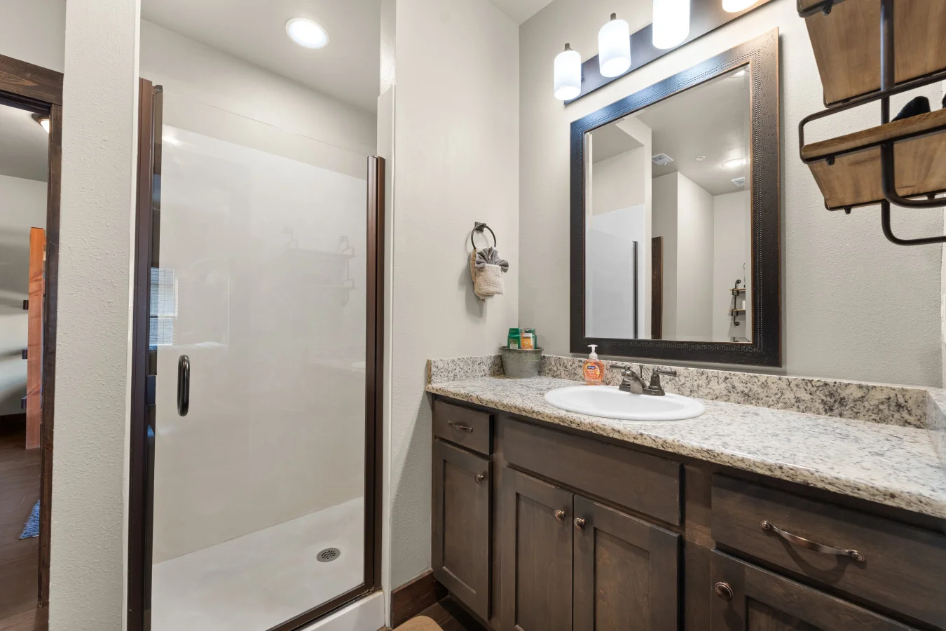 Clean, modern, and convenient. Our Jack and Jill bathroom offers a beautiful walk-in shower and dual access, making it the perfect shared space for families or friends staying on the same level.