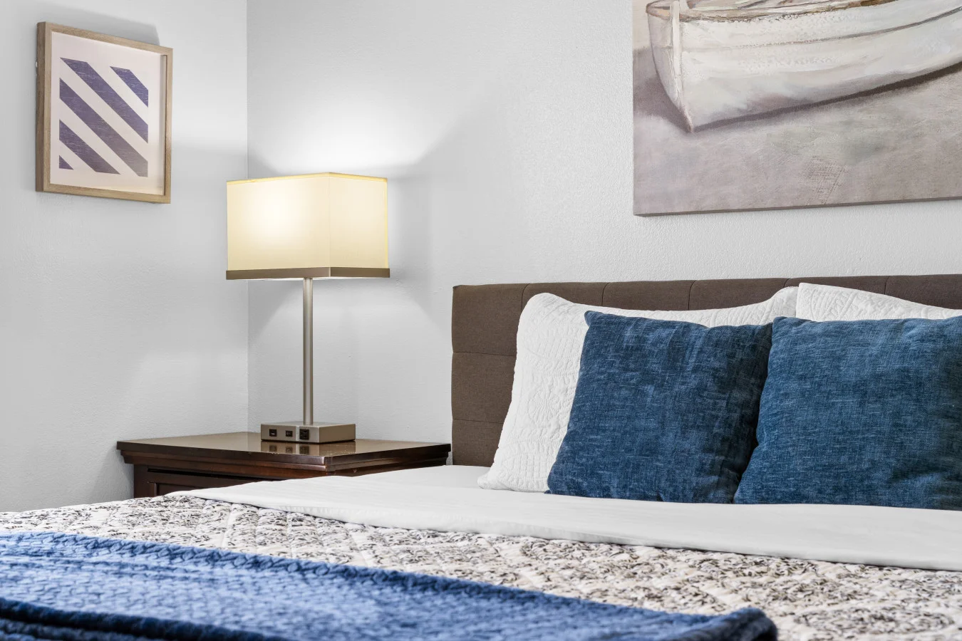 Serenity starts here. 🕊️ This bright bedroom is all about slow mornings and deep sleep. With a plush King bed and a quiet location away from the main hub, it’s a tranquil escape with the hallway bath just steps away