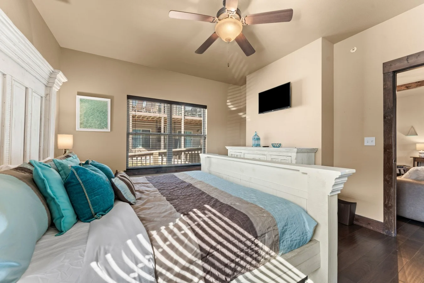 Rest and relax in this king bedroom, thoughtfully positioned on the main level. With wide clearances and an attached accessible bathroom, this suite ensures every guest enjoys total independence and comfort