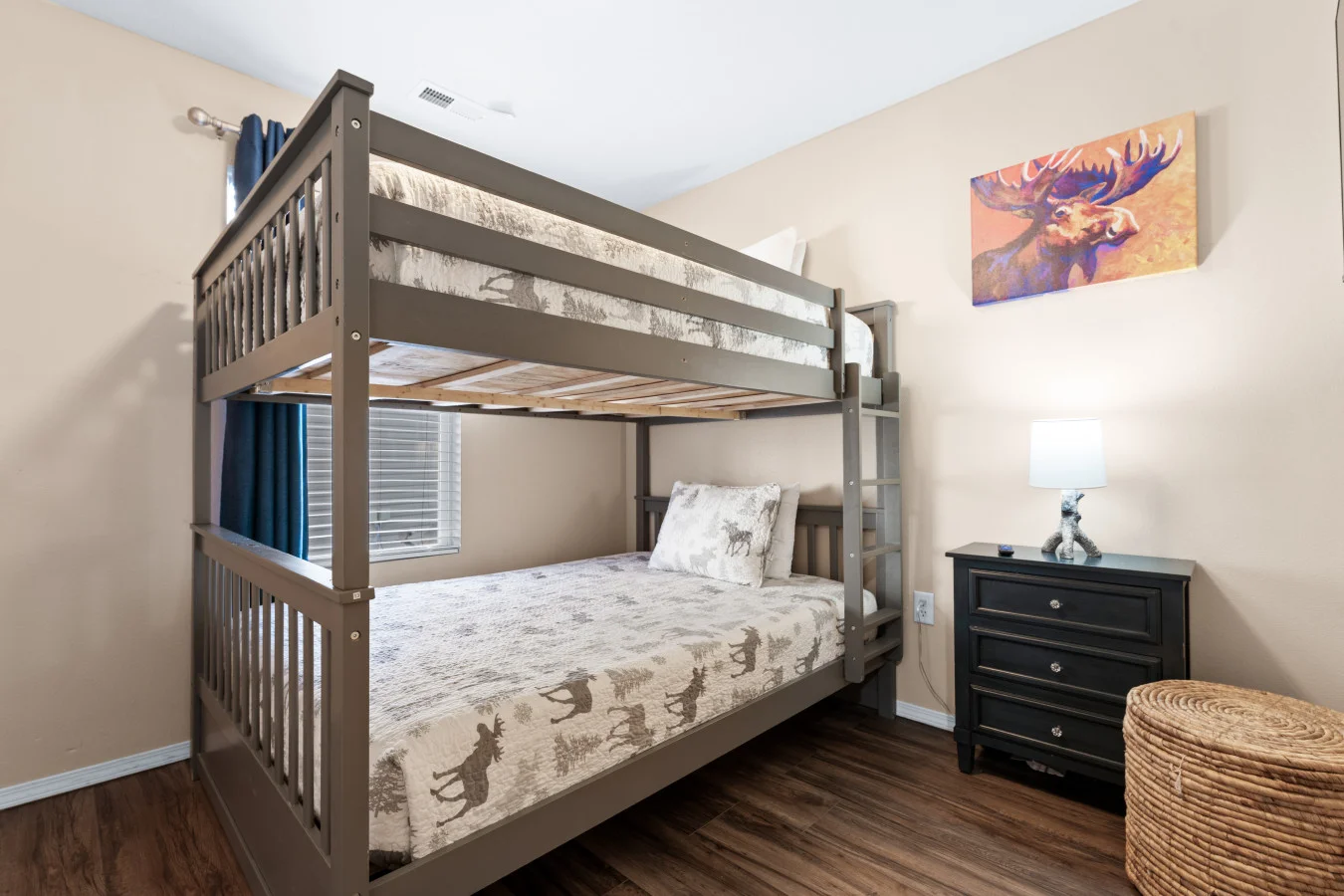 Room for the whole crew! 🏃‍♂️ This room is a kid-favorite, offering a fun 'clubhouse' vibe right off the main hallway. It’s the perfect spot for the little ones to recharge in a peaceful, family-friendly environment after a busy day of exploring.