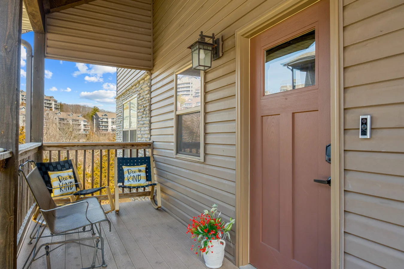 A warm Branson welcome awaits. With plenty of seating for the whole crew, this covered porch is a favorite for evening chats and watching the world go by.