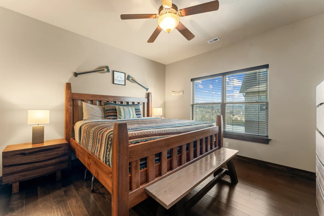 This expansive bedroom features a California King bed, designed to be the ultimate retreat after a full day of lake adventures