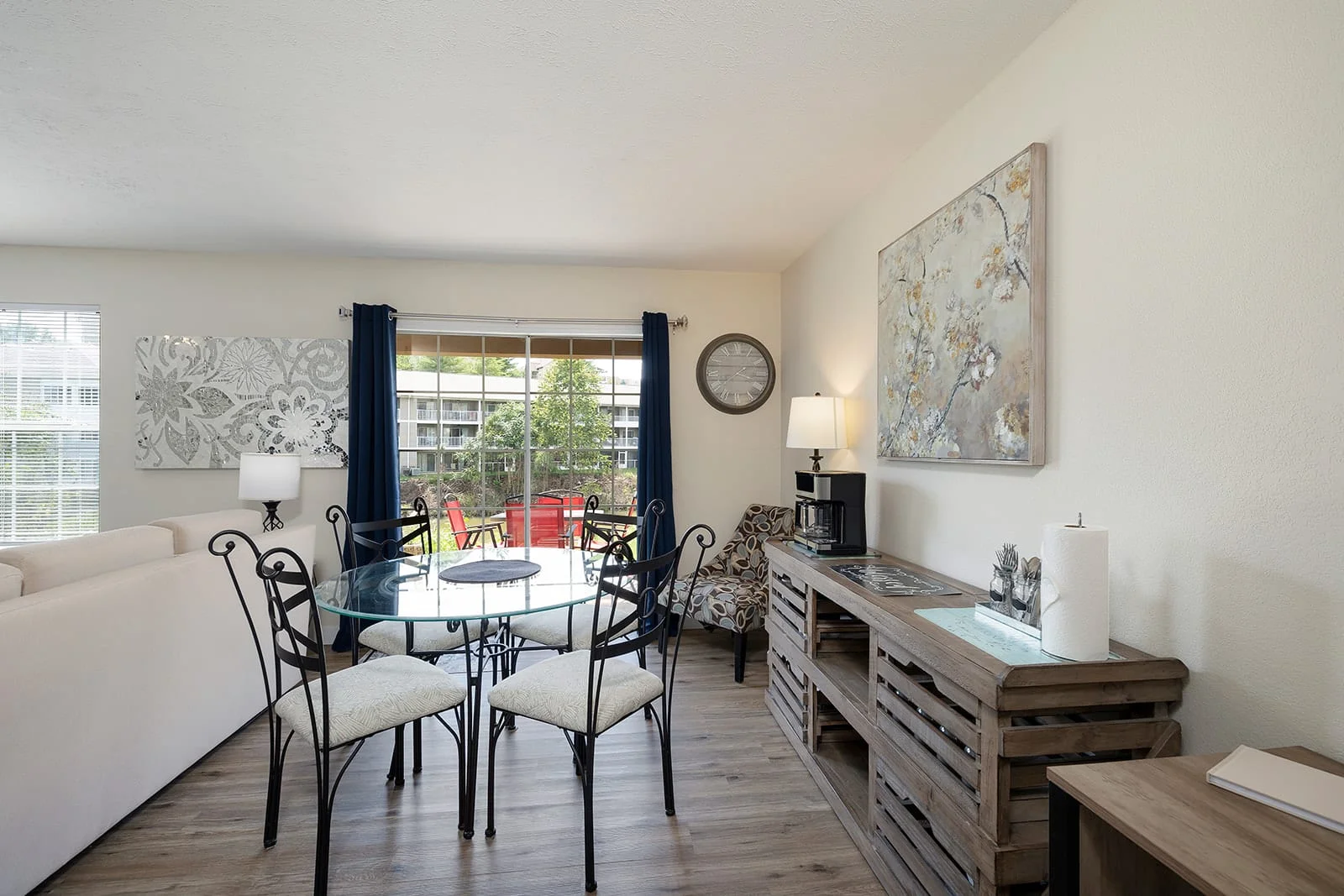 Cute dining area with table, chairs and coffee