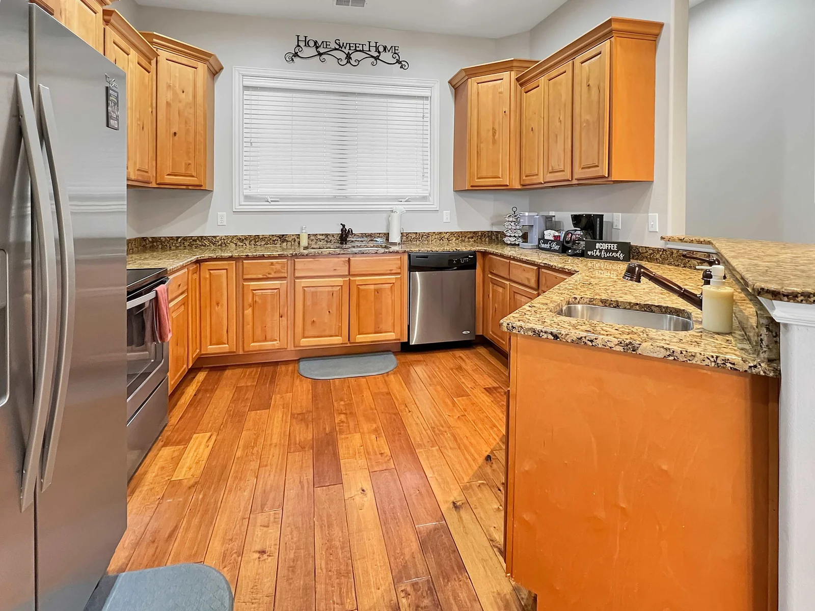 This beautiful kitchen is equipped with all stainless steel appliances