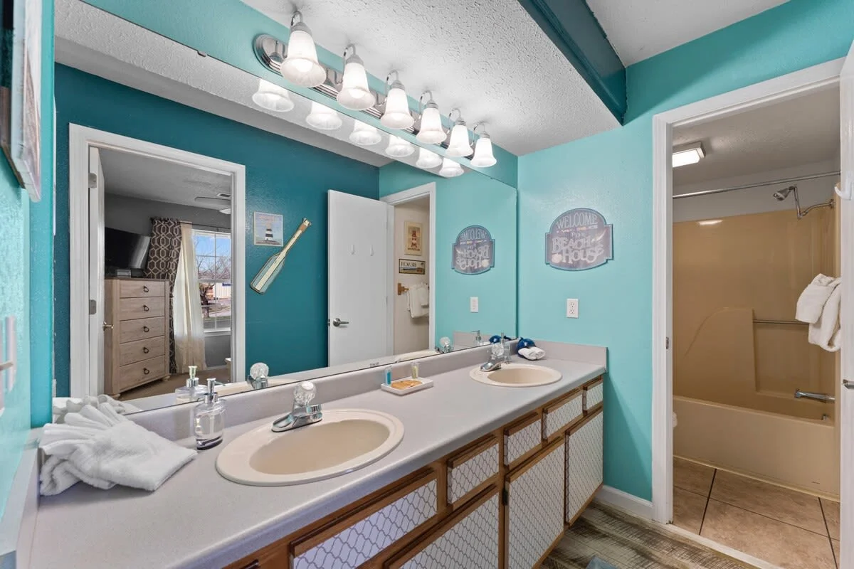 Double vanity along with tub and shower