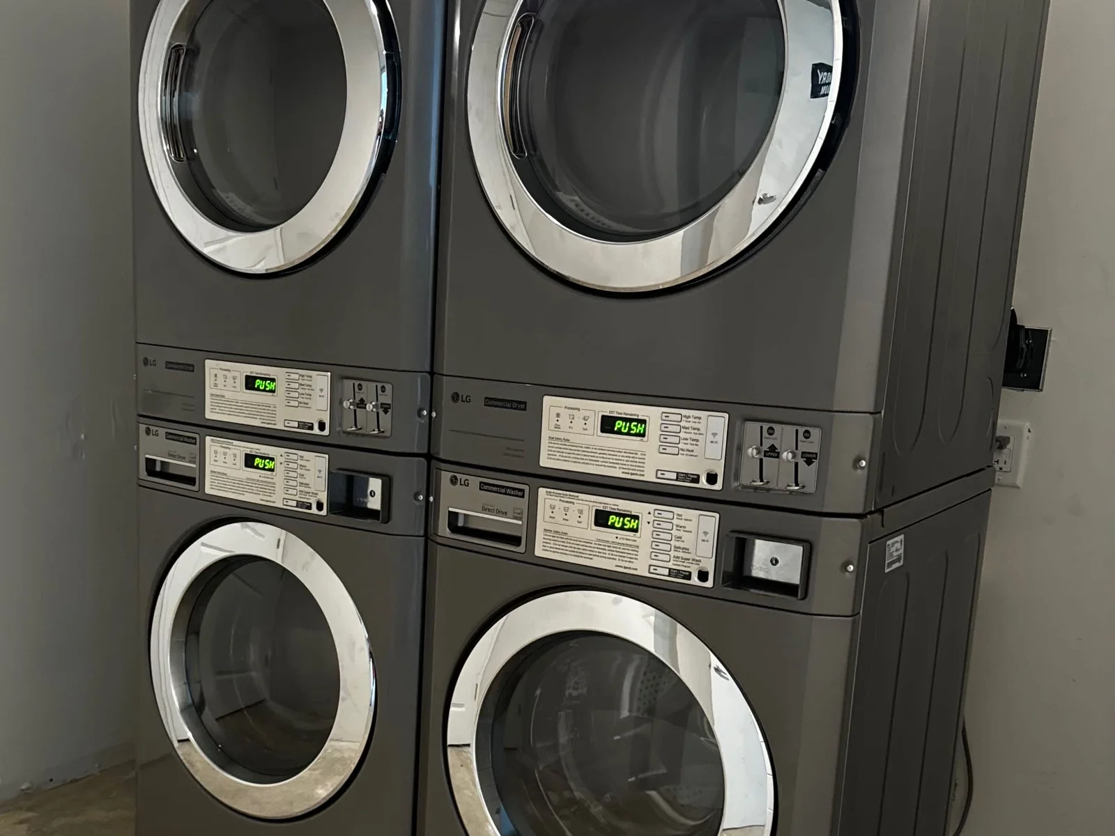 Coin operated laundry on the second floor outside of the elevators