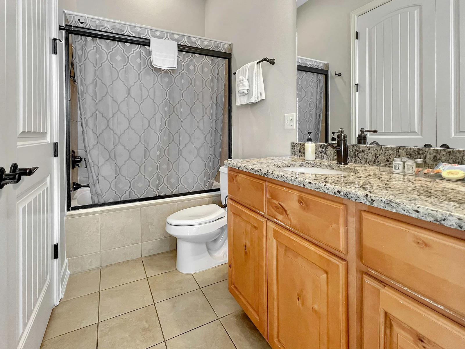 Ensuite bathroom with tub and shower