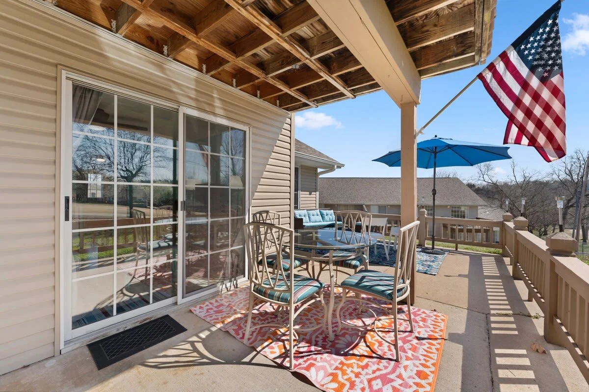 Large beautiful patio with outdoor covered dining table