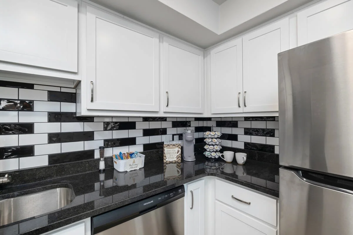 Grab your morning coffee from the coffee station with Keurig coffeemaker and coffee supplies.