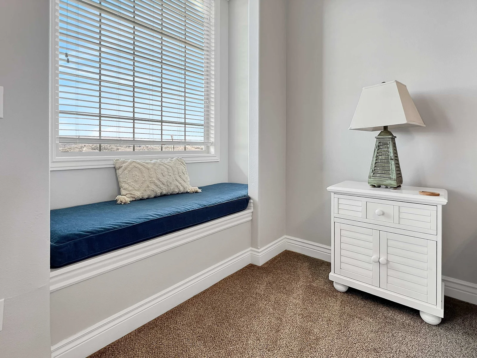 Cuddle up with a blanket and read a book in this little nook