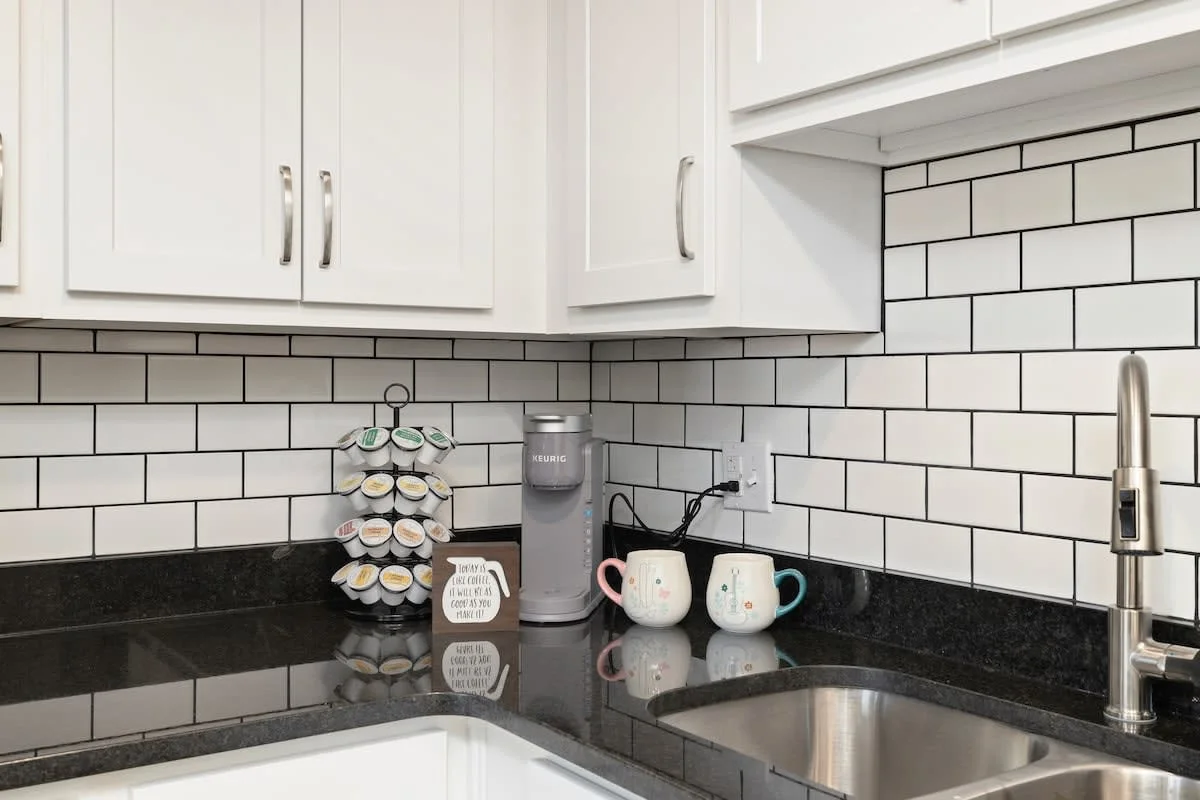 Grab your morning coffee from the coffee station with Keurig coffeemaker and coffee supplies.