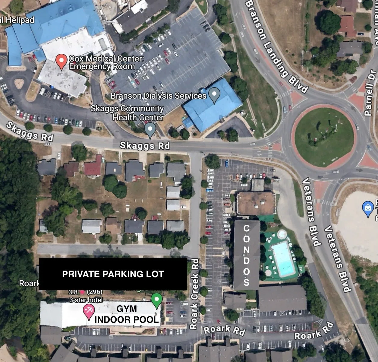 Overview of property including cox medical, gym, indoor pool and roundabout