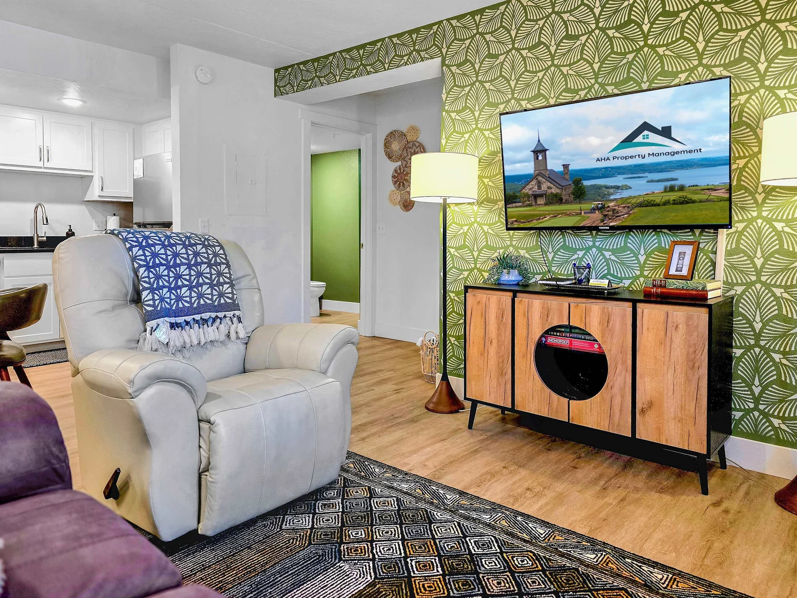 Comfy, beautiful living room with stylish, fun decor. Sit back in your sweet recliner and just enjoy the day.