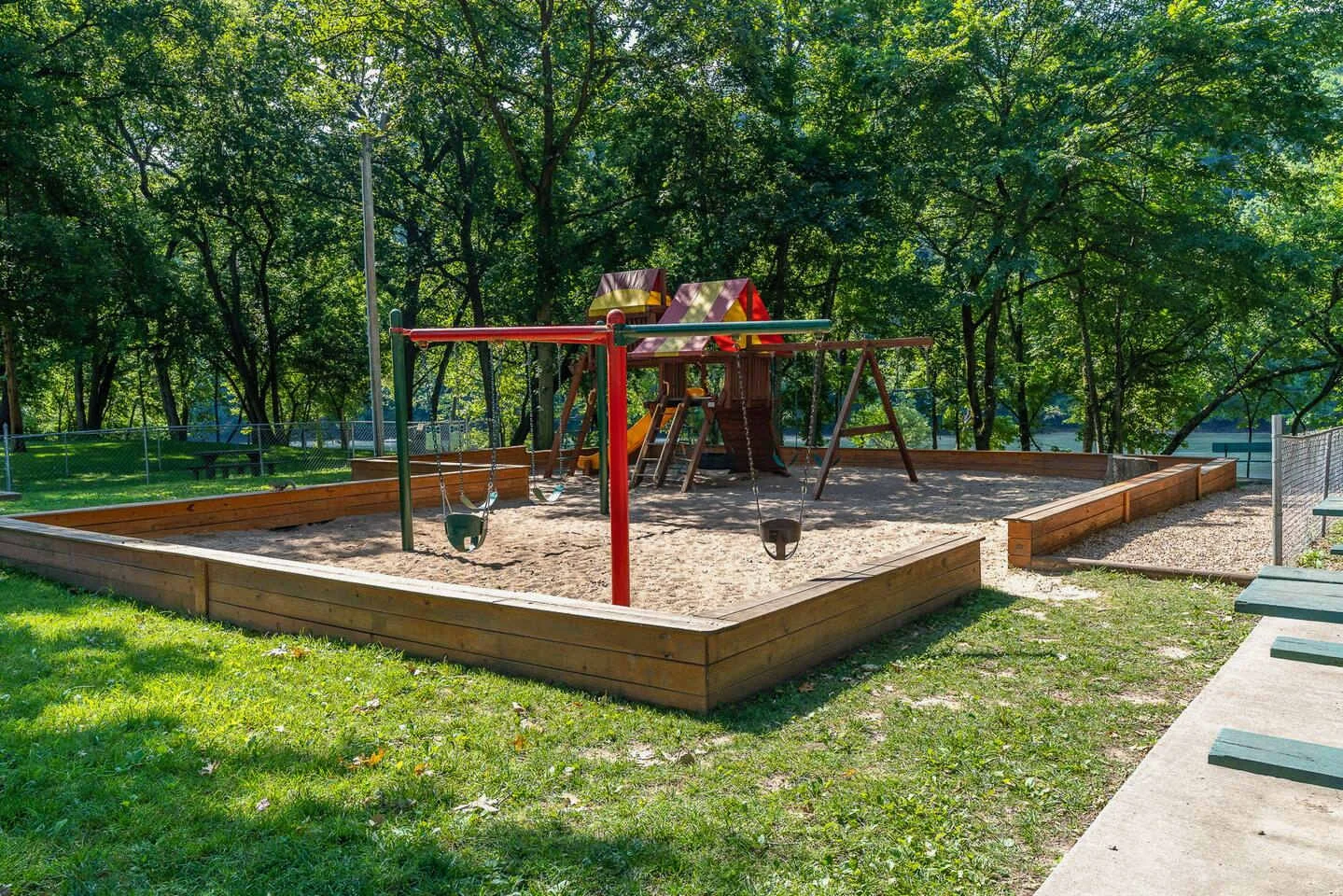 Take the kids to the playground right by the White River.