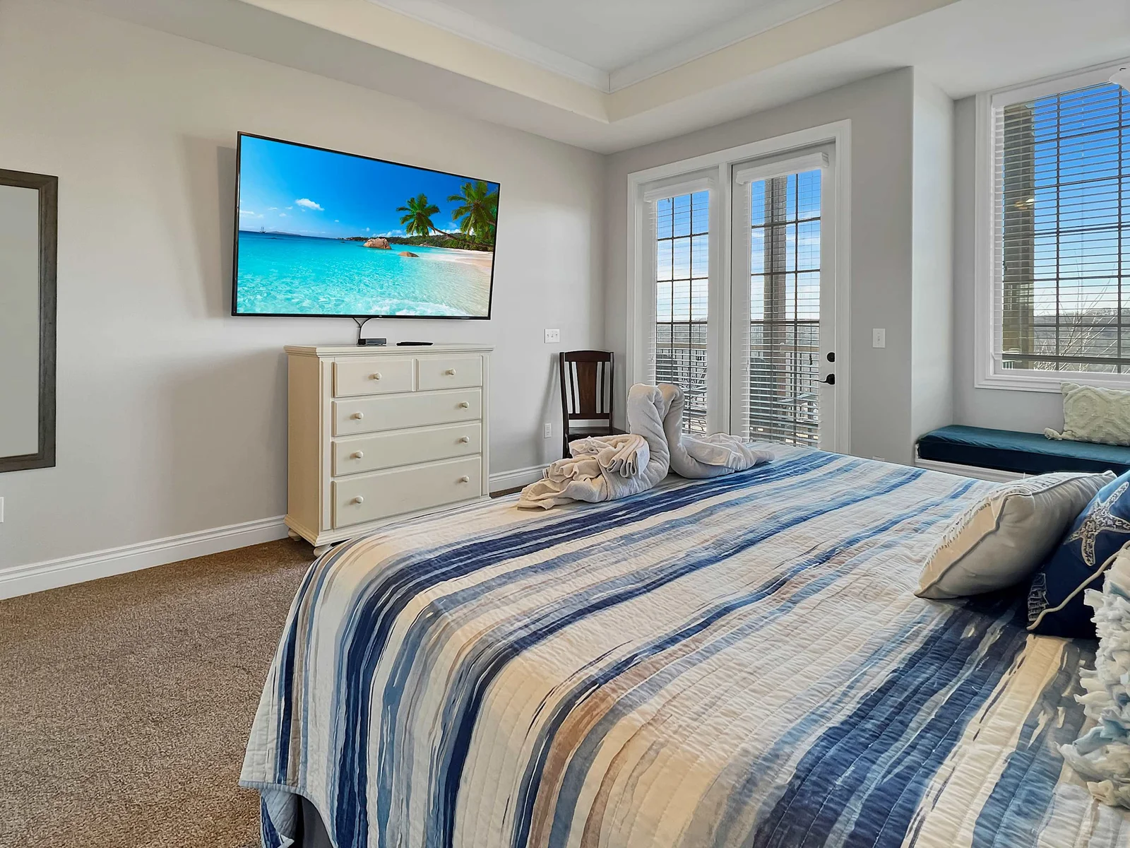 The master bedroom has a king bed and is very spacious with an exit that leads out to the balcony and one of the worlds most beautiful views.