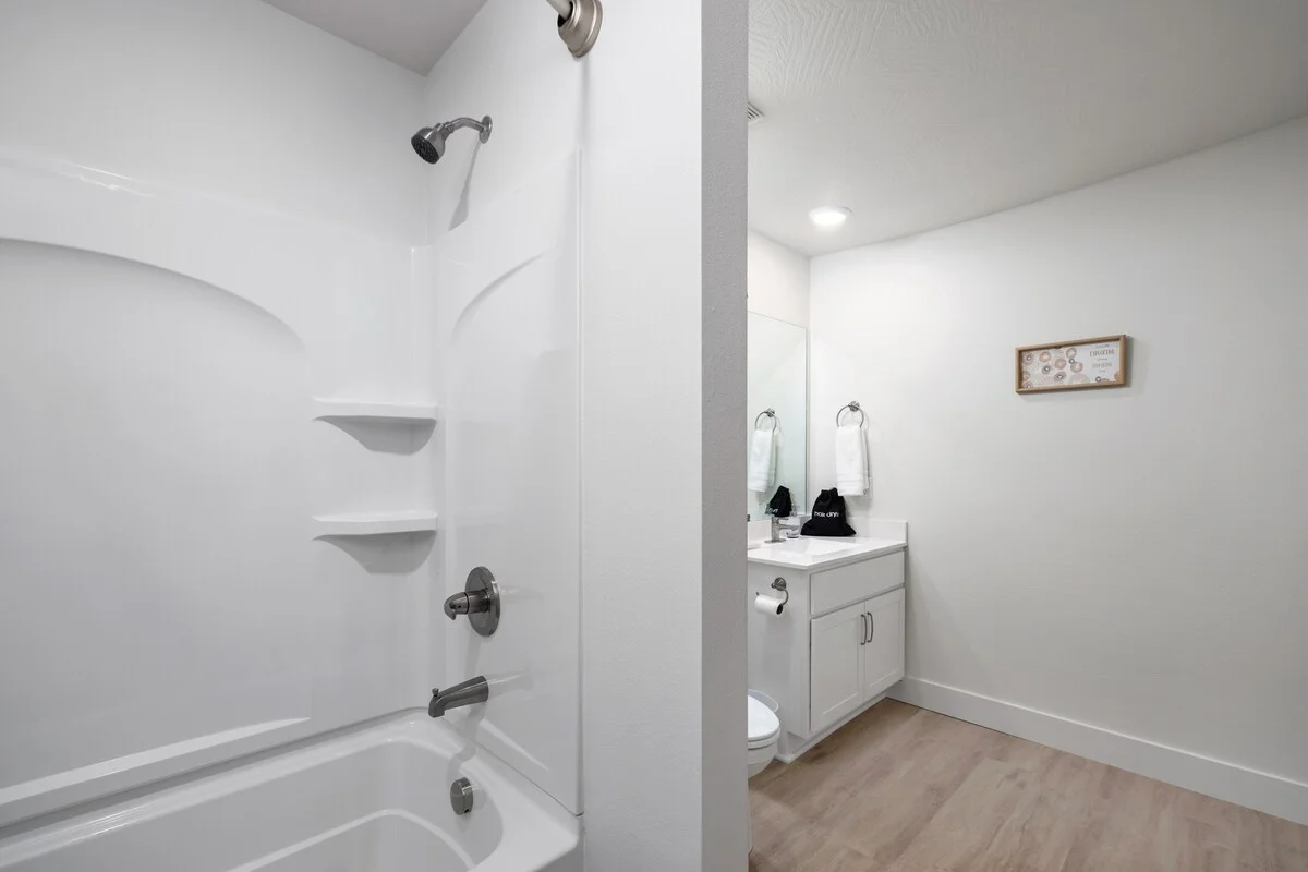 Large bathroom with tub and shower