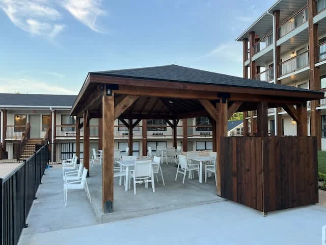 Beautiful gazebo with tables and chairs for you and your family to enjoy