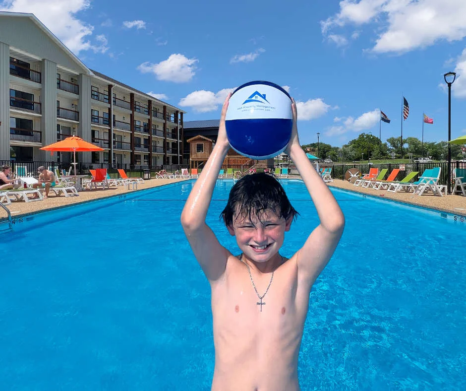 Davis is having a blast in one of Branson's most beautiful outdoor pools, complete with pavilion, outdoor firepit and kids play area.