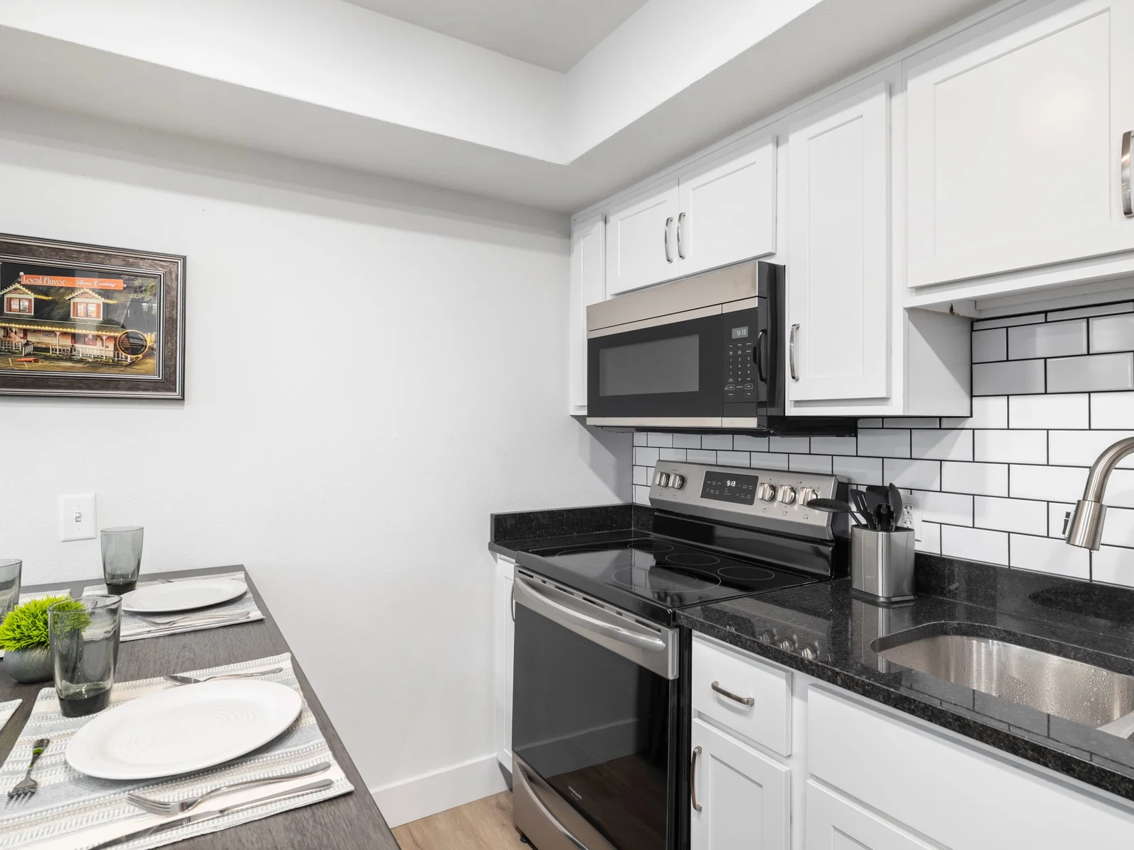 You’ll find plenty of prep space on the countertops, along with all the cookware, bakeware, dishware, flatware, glassware, serving-ware, and utensils you need to prepare and serve your favorite meals.