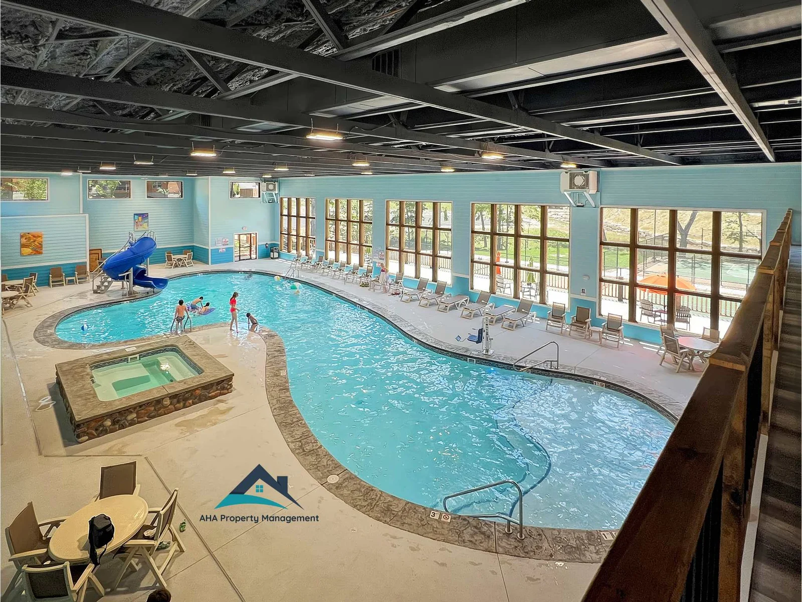 Awesome indoor pool with slide and large hot tub