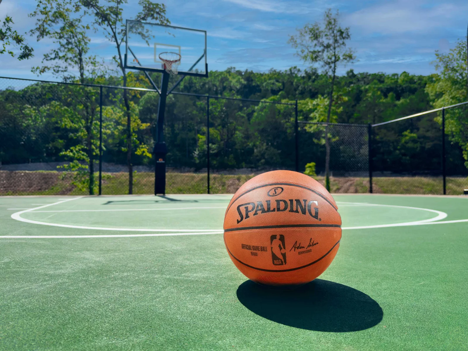 Shoot hoops just steps from your cabin—balls provided, fun guaranteed!