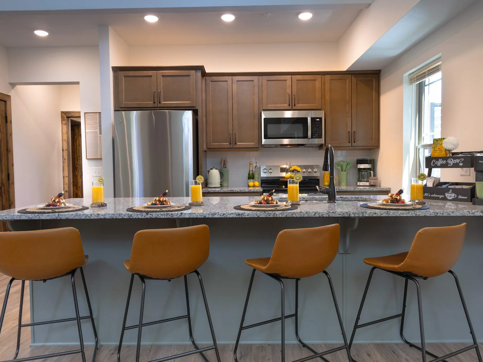 Start your mornings or gather for evening chats at the beautiful kitchen bar, where seating for six makes it easy to sip, snack, and stay connected in comfort and style.