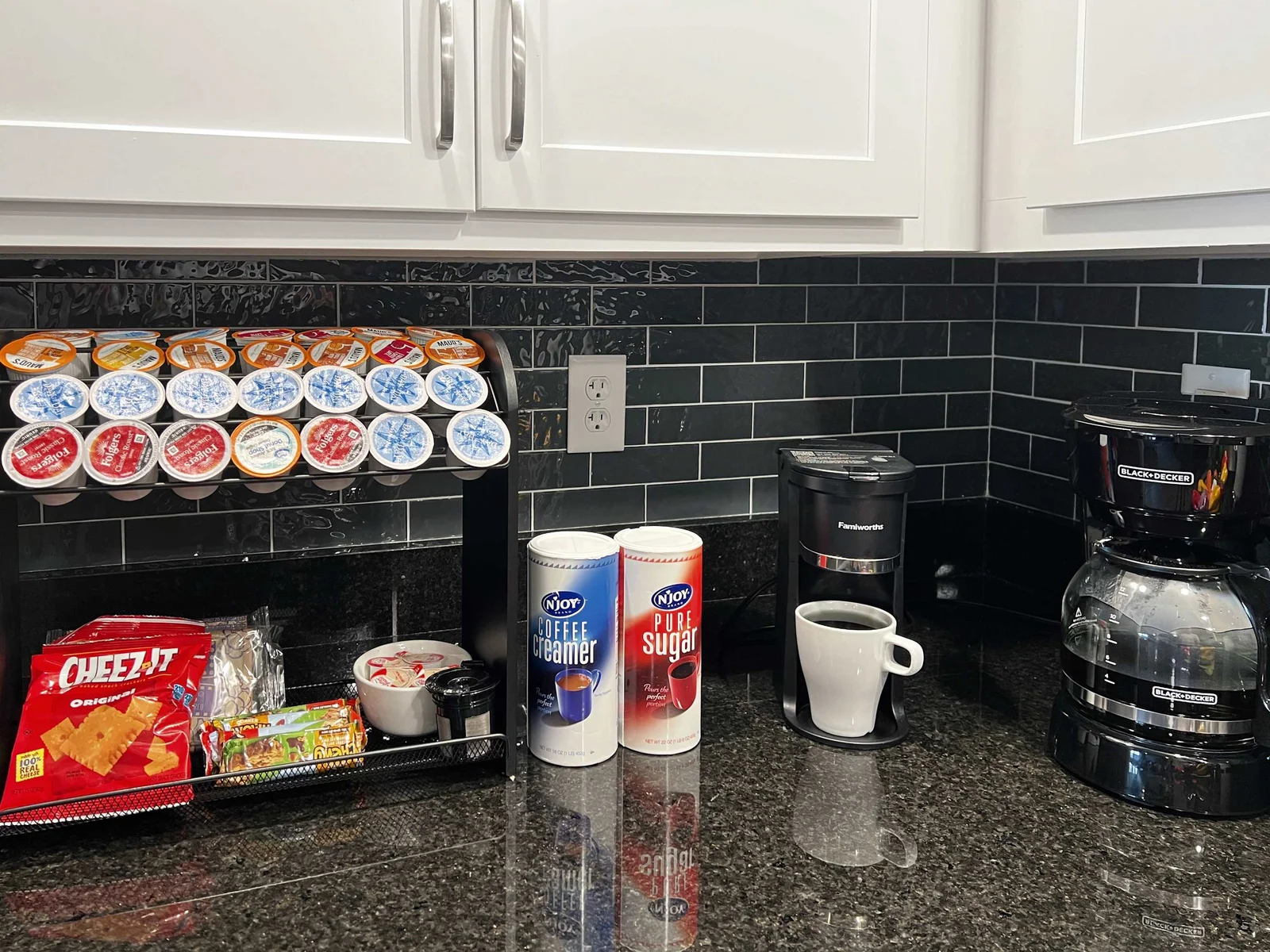 Complete coffee bar and snack tray for your arrival. Variety of K cups provided