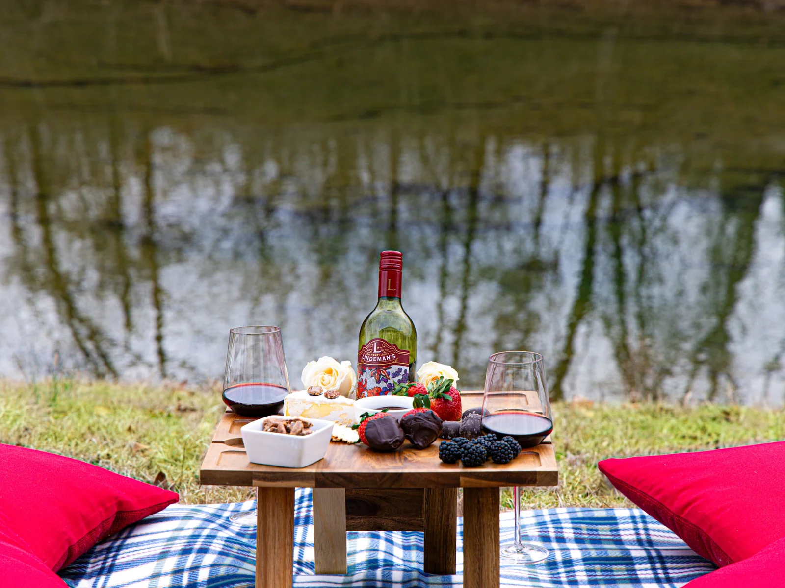 Looking for a break from all your adventures? Grab our outdoor picnic blanket & wine table to create the perfect creekside picnic.