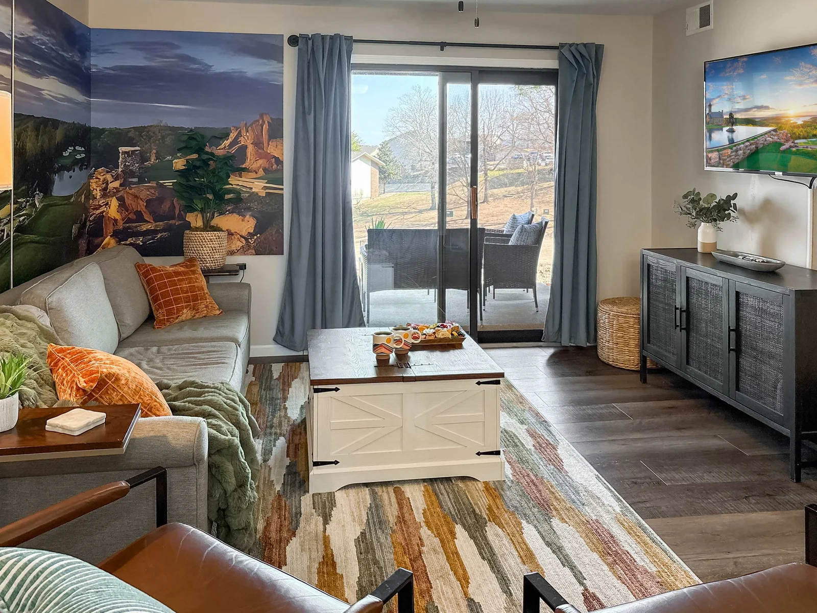 The living room opens out to the kitchen and the backyard patio.