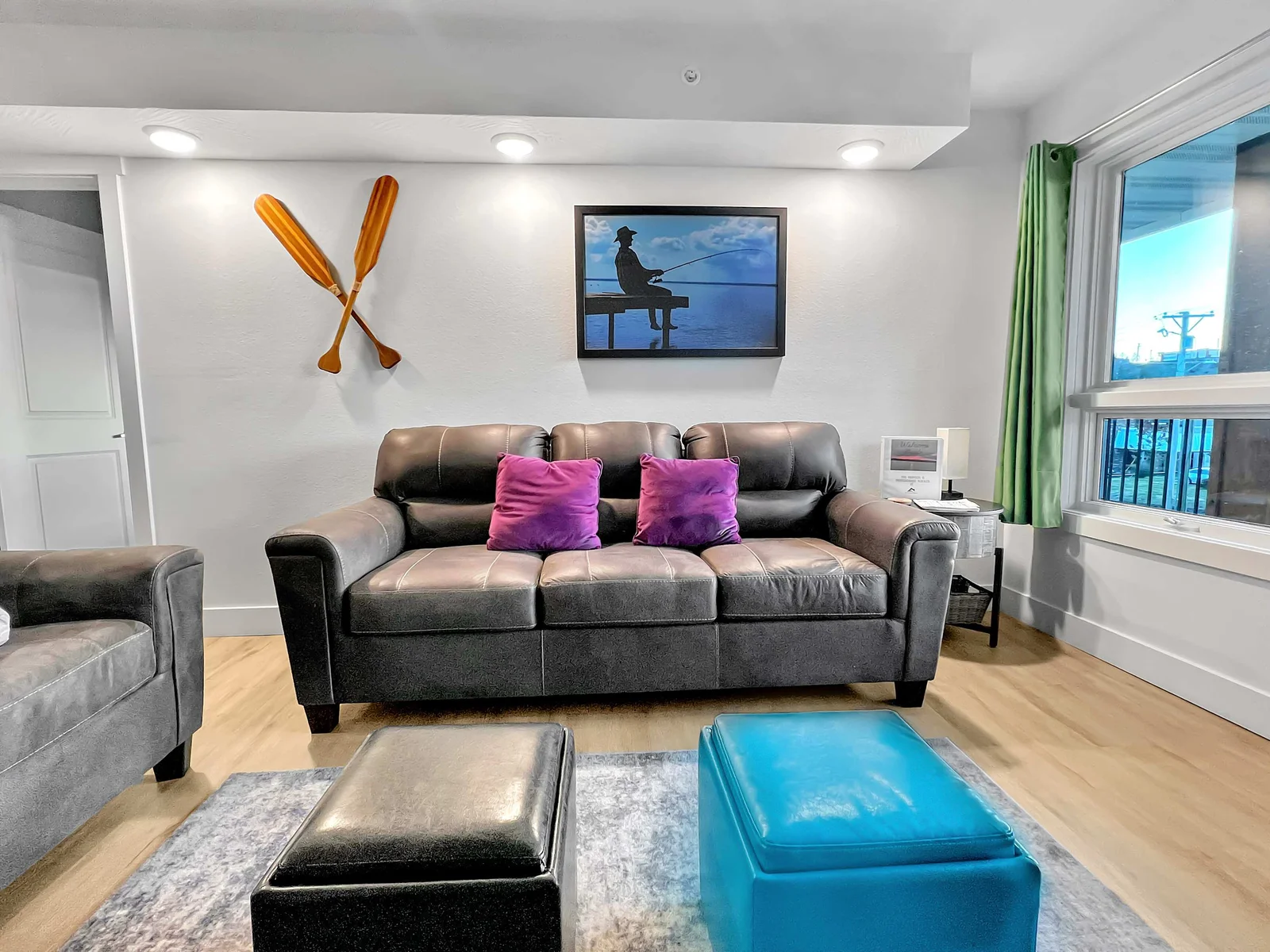 Comfy living area with beautiful leather furniture for you to relax and enjoy some streaming tv or a cup of coffee and a good book.