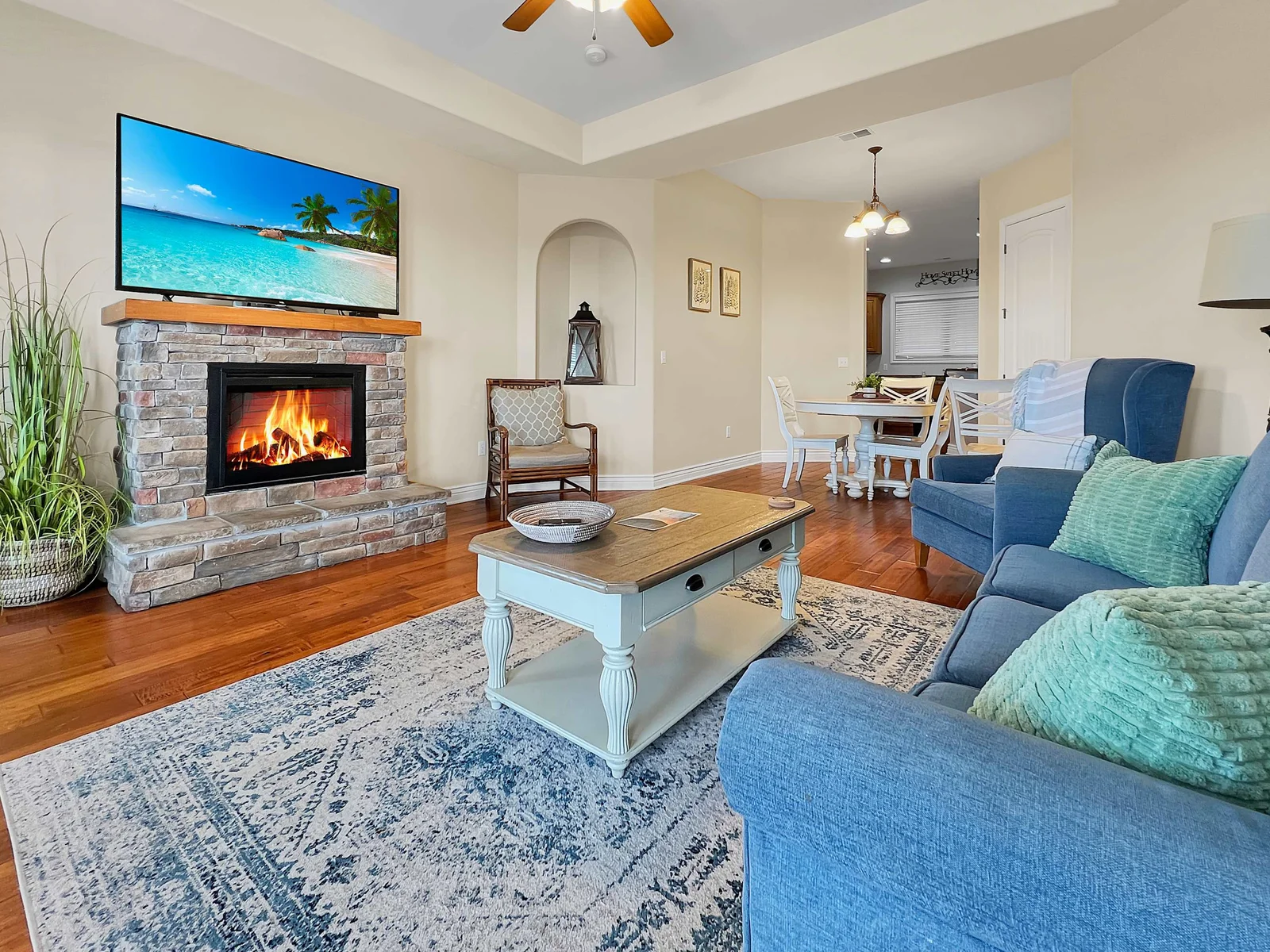 High vaulted ceilings, beautiful wood floors and all of the comforts of home.