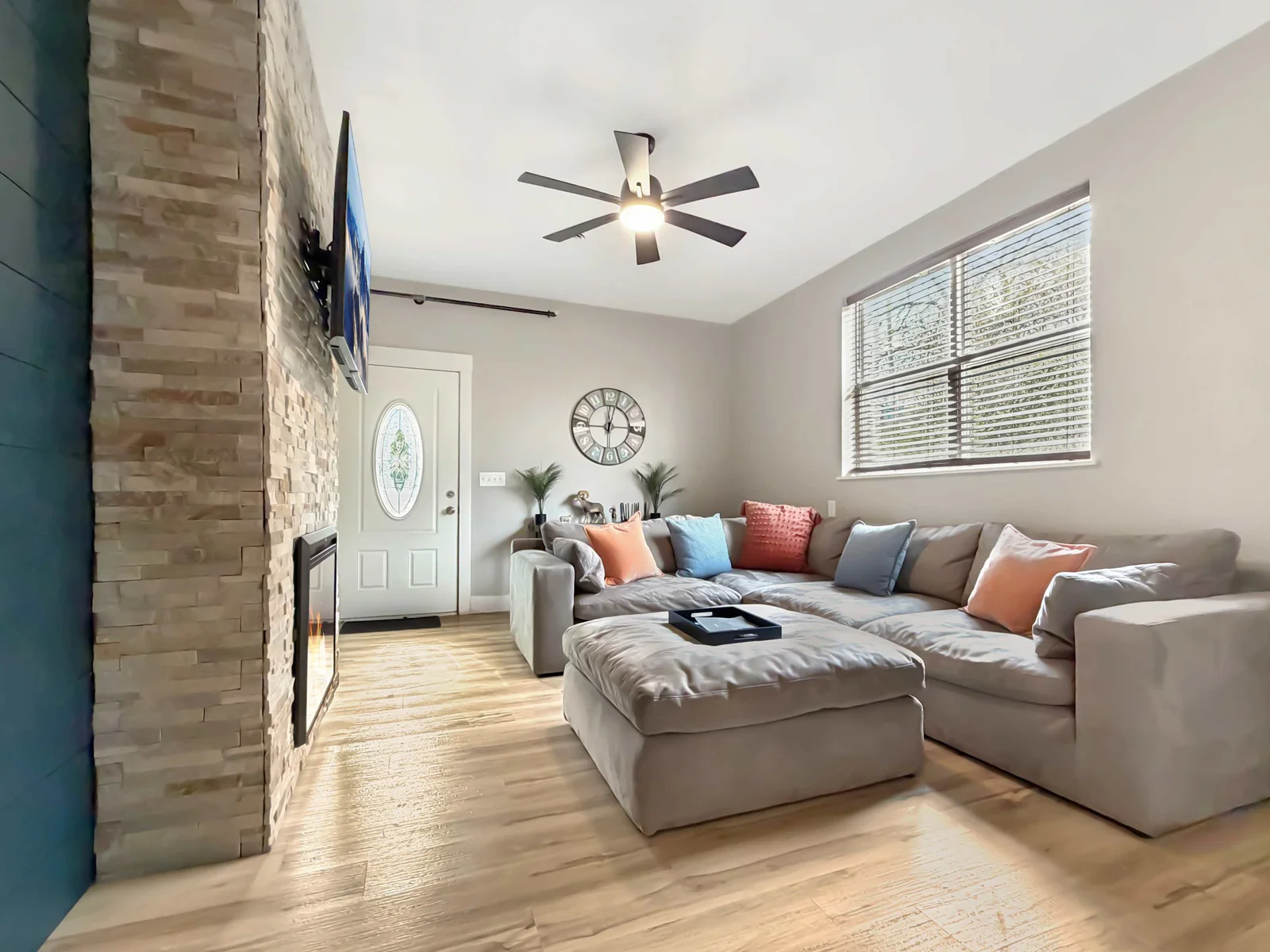 Cozy up to the fireplace while enjoying the comfort of a large sectional