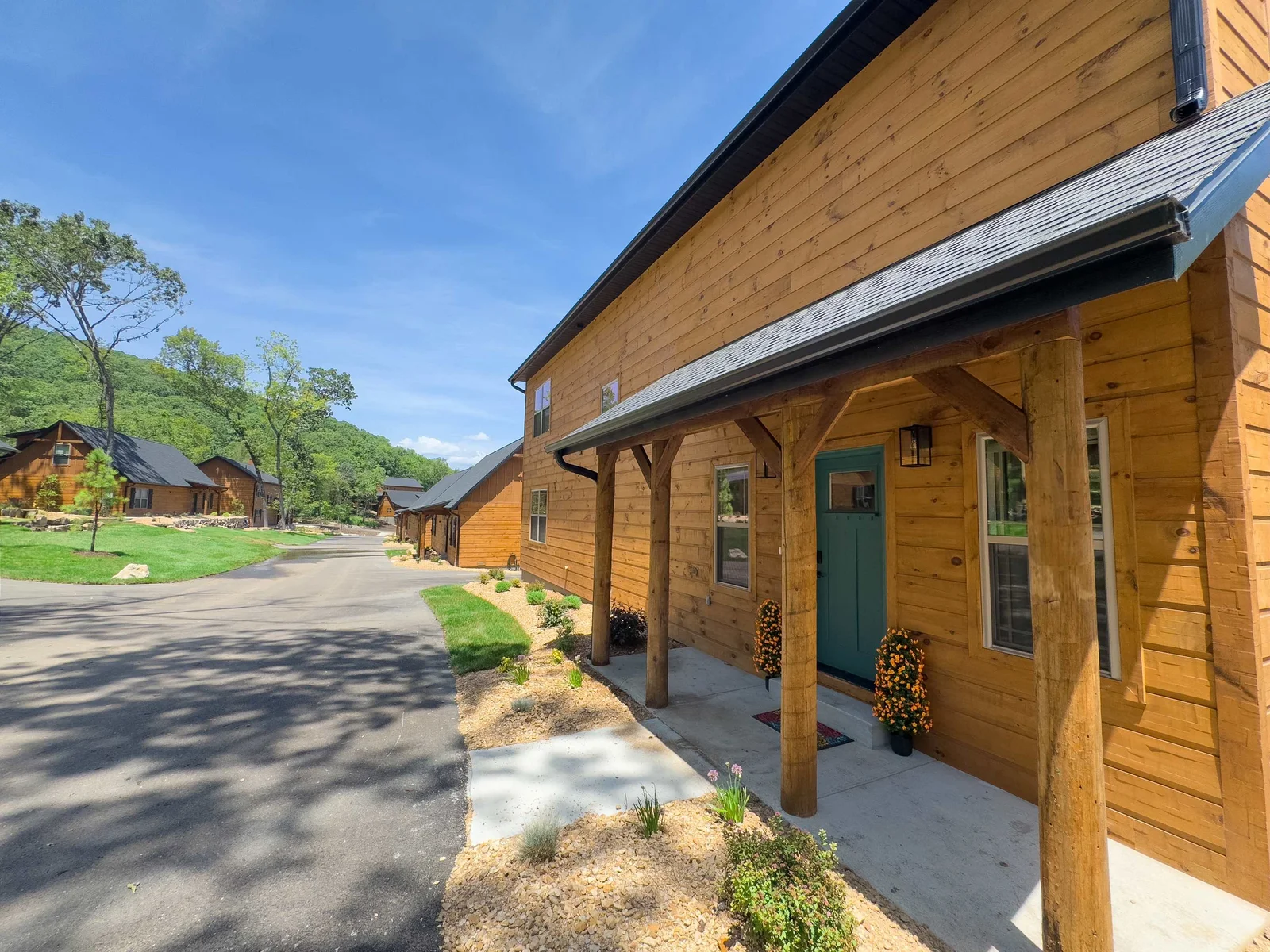 Tucked within the serene beauty of Tall Timbers Camp, this two-story upscale wood cabin offers a luxury vacation expeirence you won't want to miss.