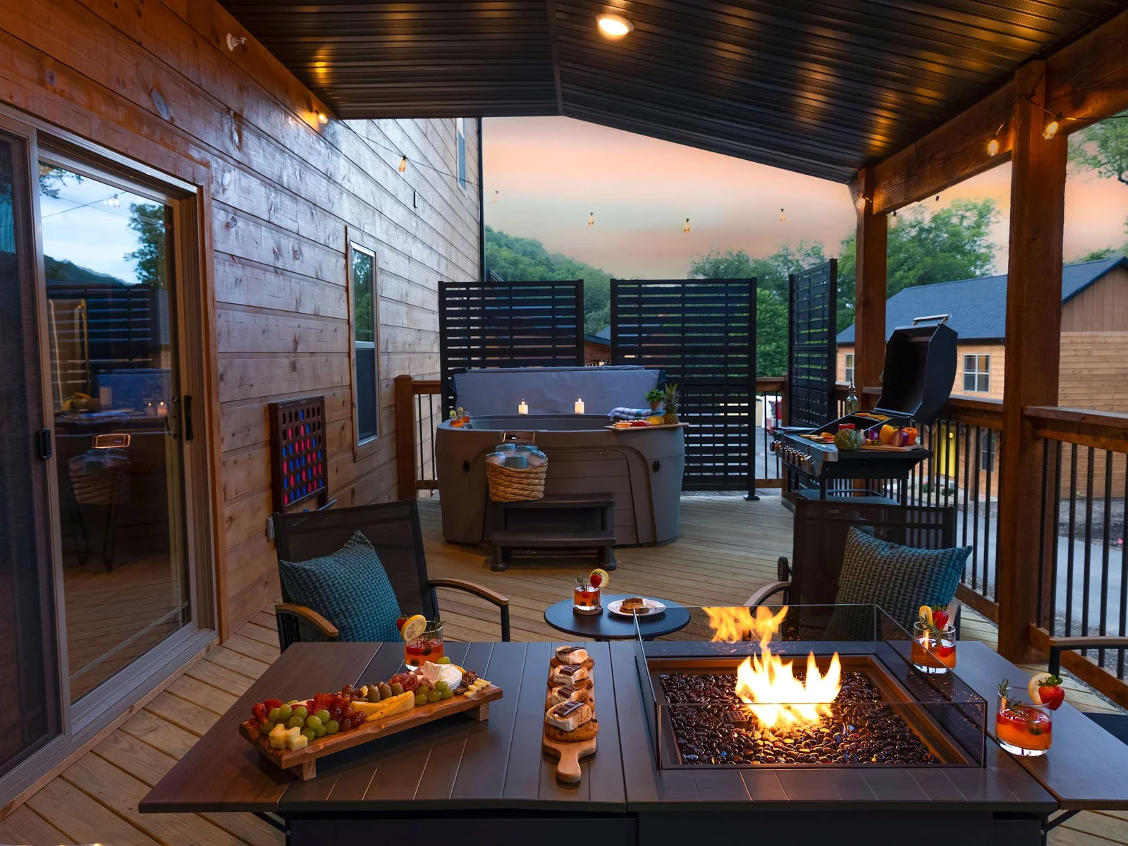 Adventure's Edge has a spacious private deck, copmlete with a hot tub, and is surrounded by towering trees and the calming sounds of nature.