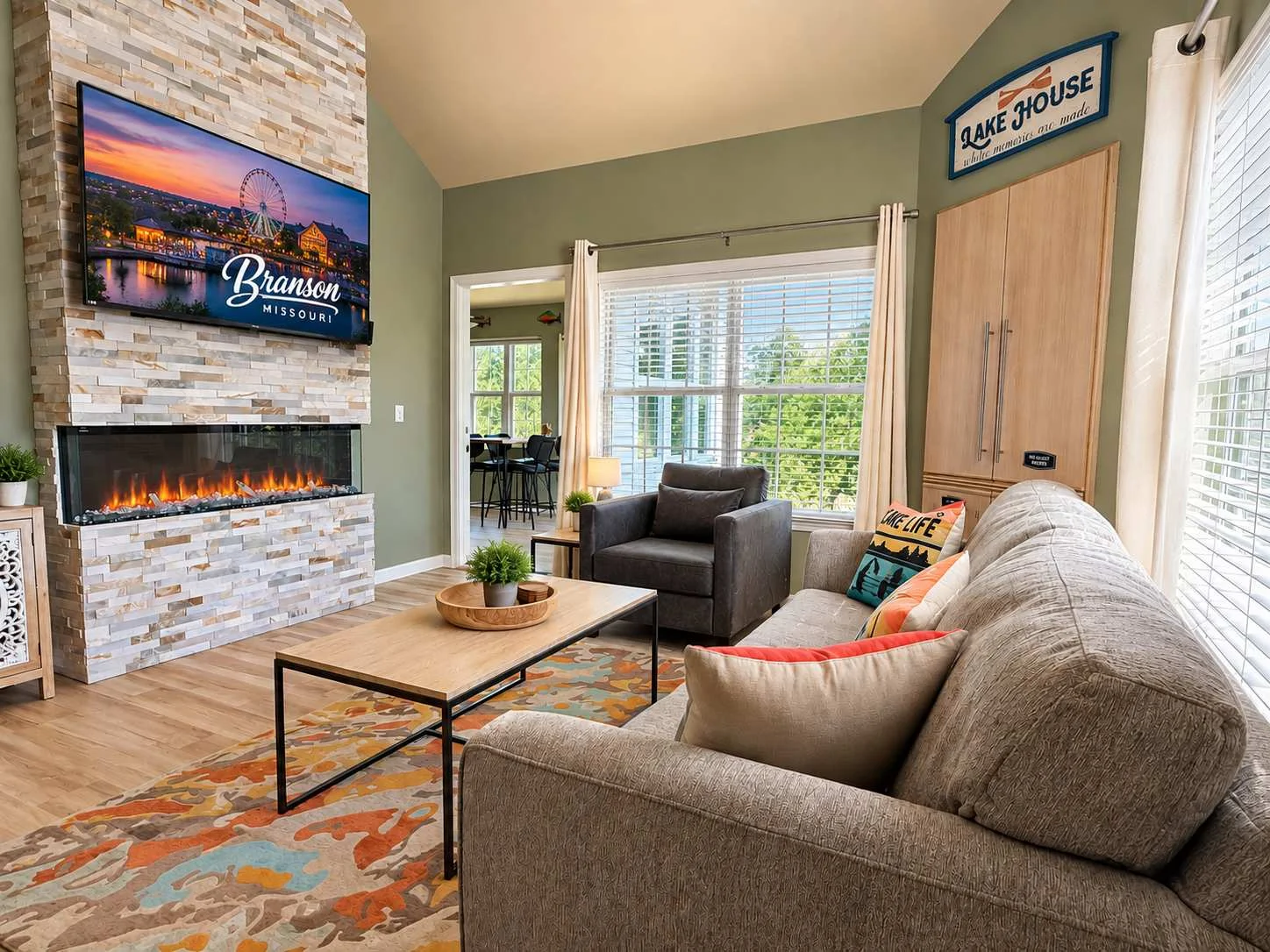 Enjoy the comfy living room with streaming tv, fireplace and a beautiful view of the lake