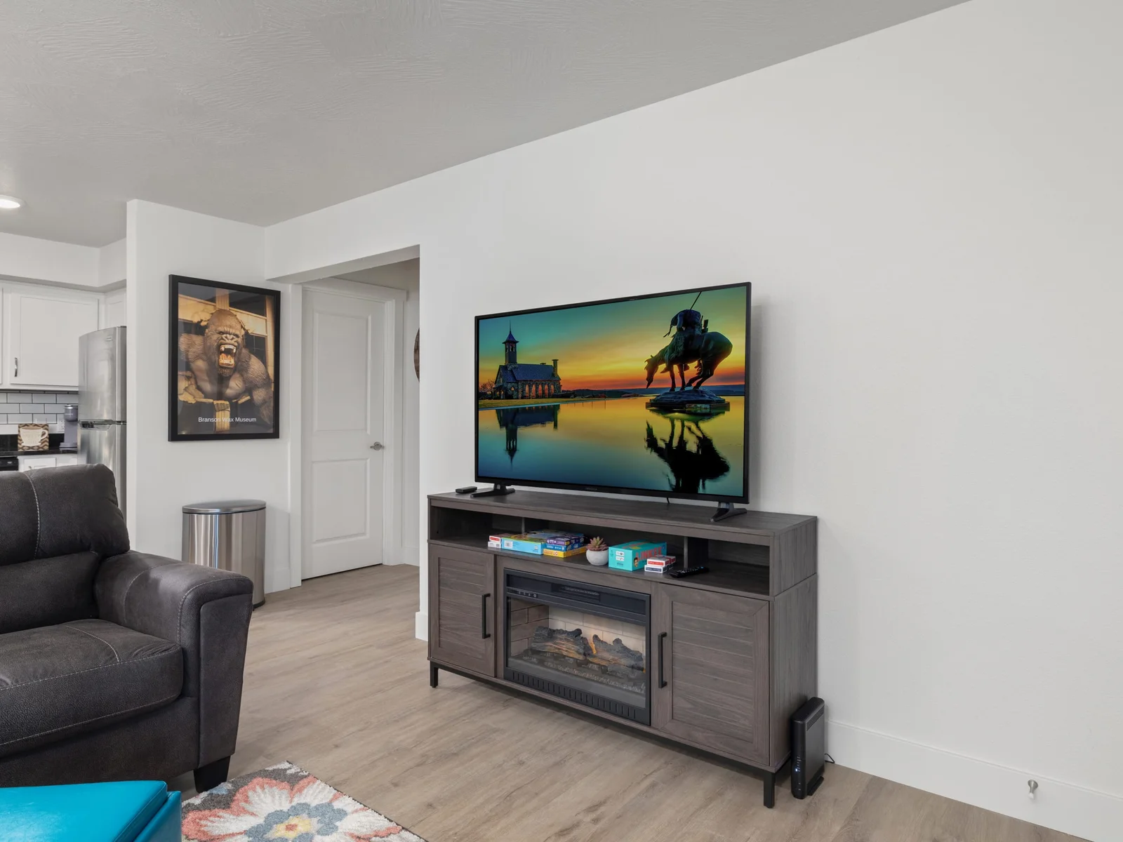 Enjoy the warmth of the electric fireplace while spending time in the living room.