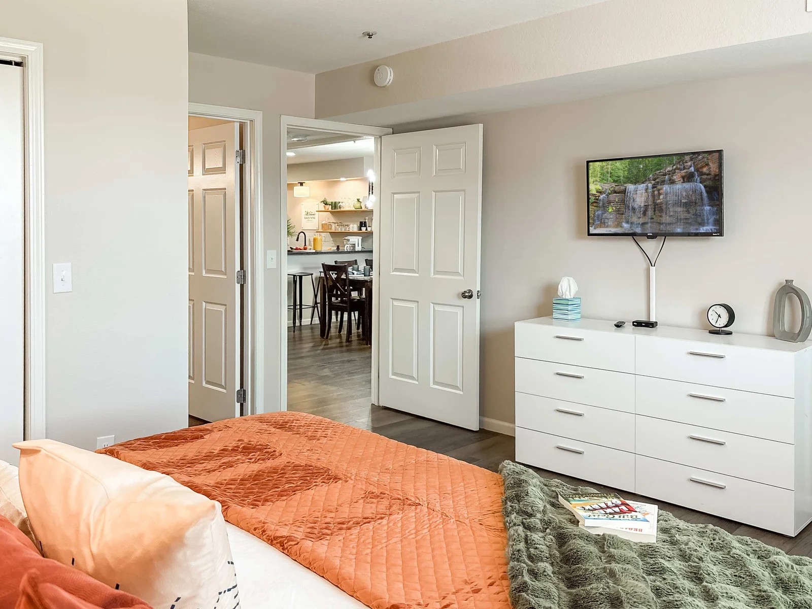 The primary suite is just behind the living room