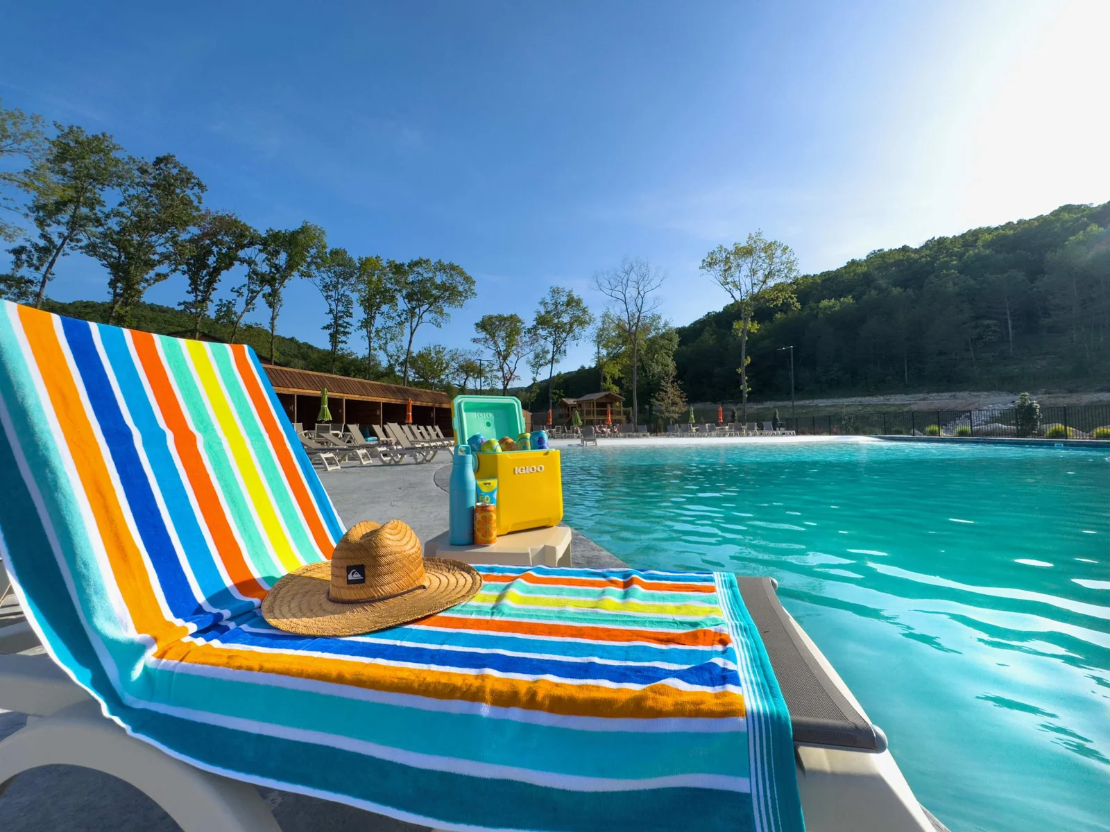 Lounge, float, or relax with your favorite refreshments and wooded views all around.