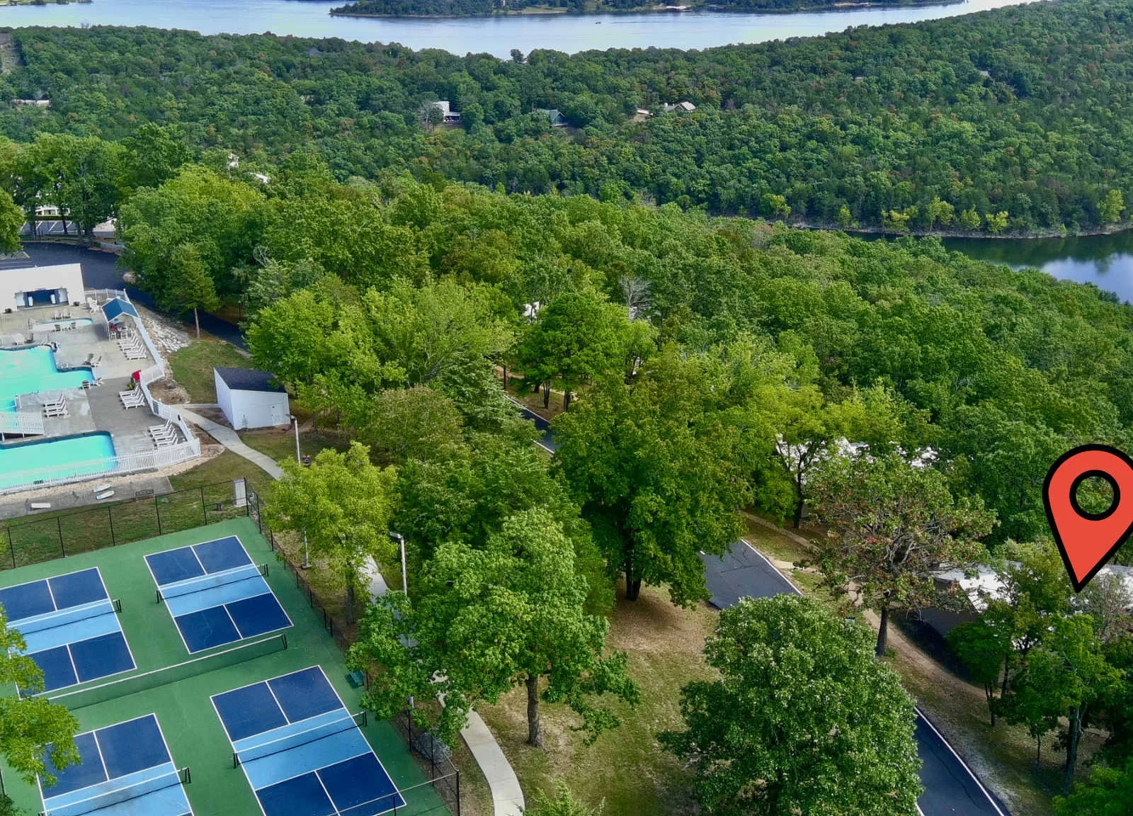 Close to the lake and right next to the beautiful pool and pickleball courts