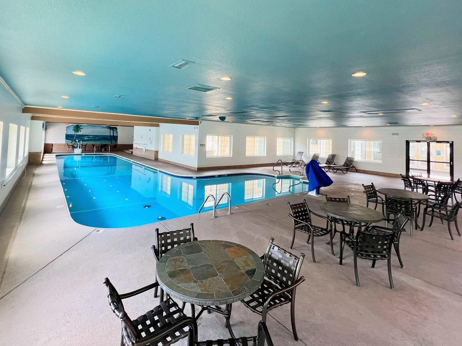 Beautiful indoor pool and seating area